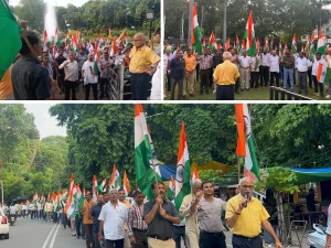Electricity workers' tricolor rally against privatization
