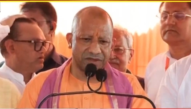 CM Yogi in Meerut: While showering flower petals on Kanwariyas, he stated that the Kanwar Yatra is an example of social unity.